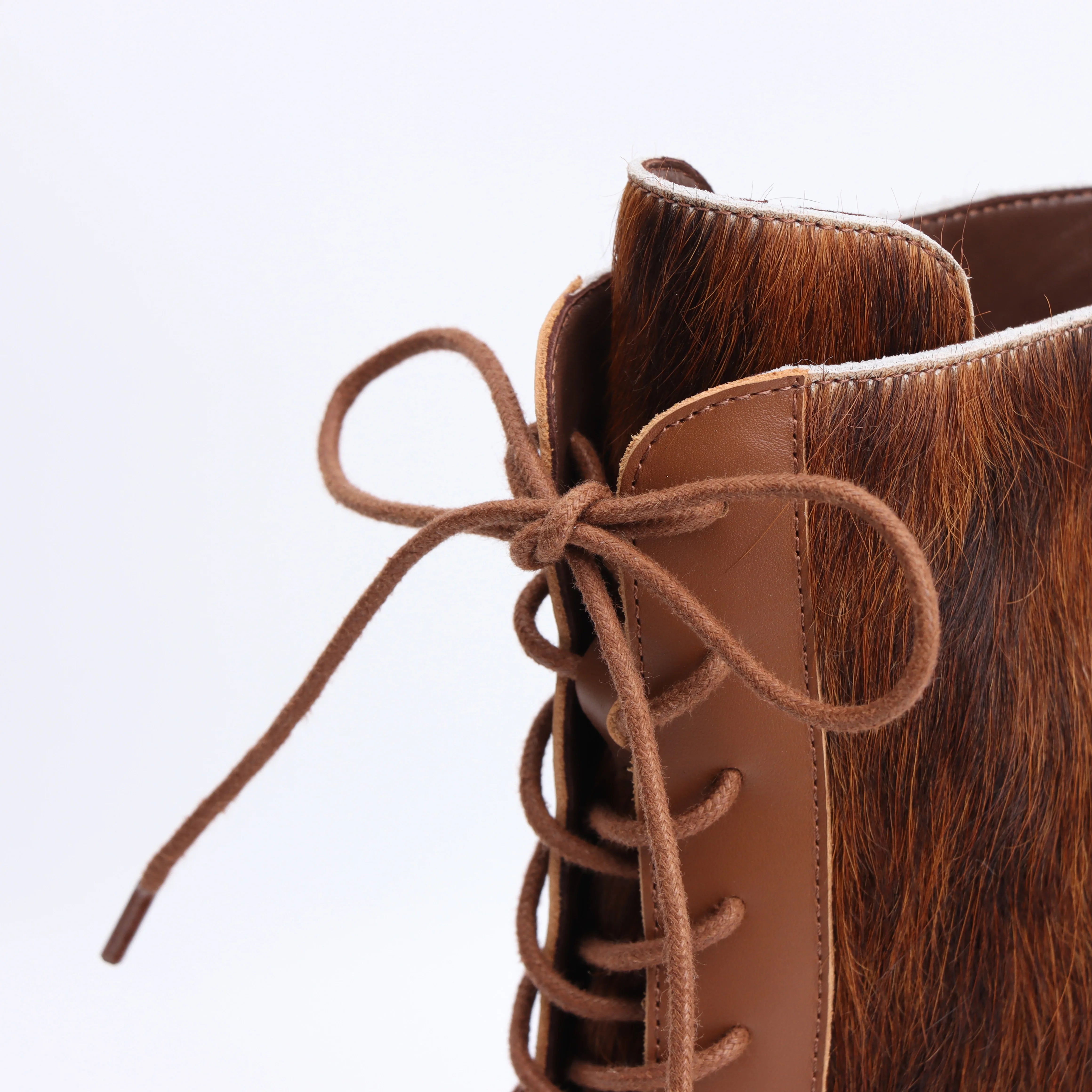 2025 designer women's British style pointed short boots with high, thin heels and lace up real leather boots